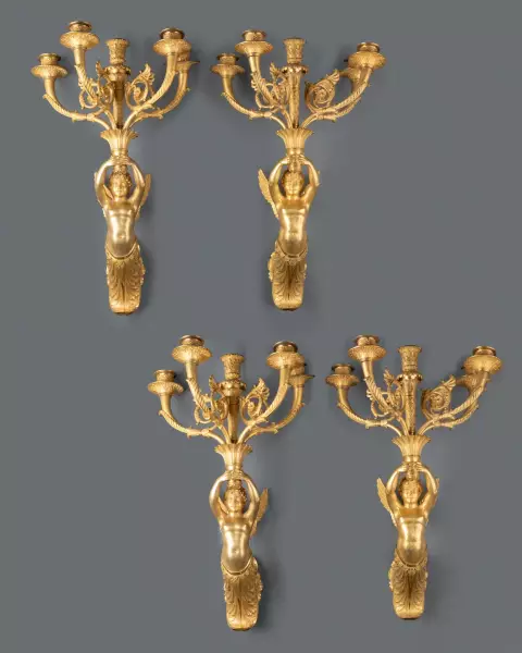 Série de quatre appliques aux enfants ailés, Paris époque Empire