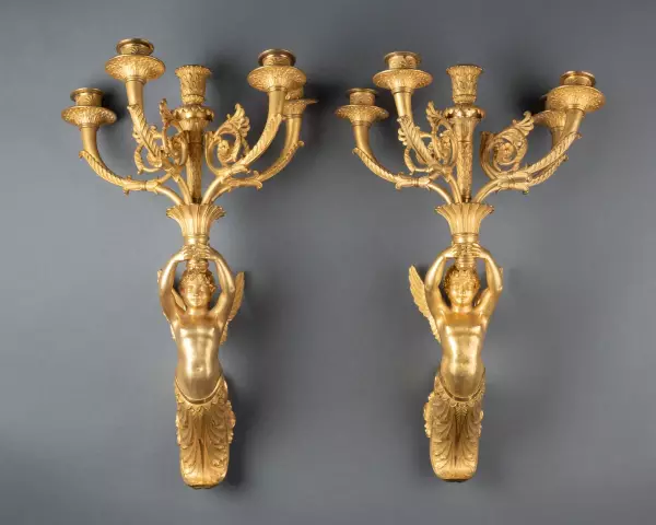 Série de quatre appliques aux enfants ailés, Paris époque Empire