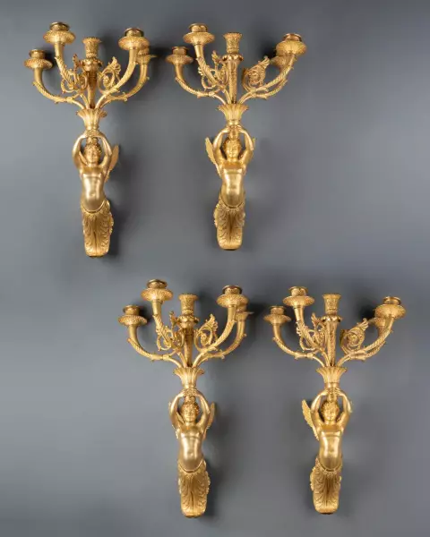 Série de quatre appliques aux enfants ailés, Paris époque Empire