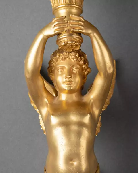 Série de quatre appliques aux enfants ailés, Paris époque Empire