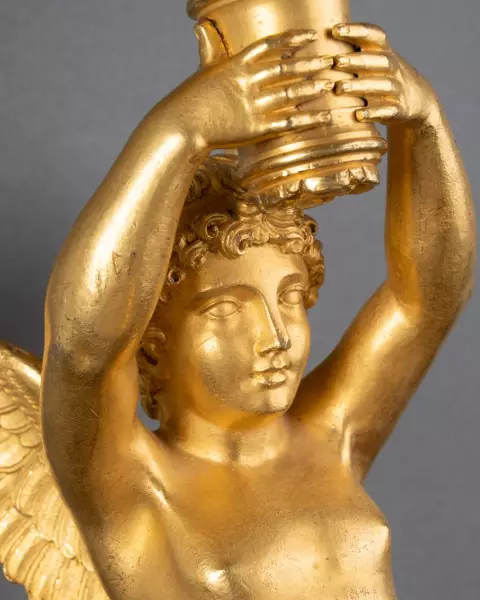 Série de quatre appliques aux enfants ailés, Paris époque Empire