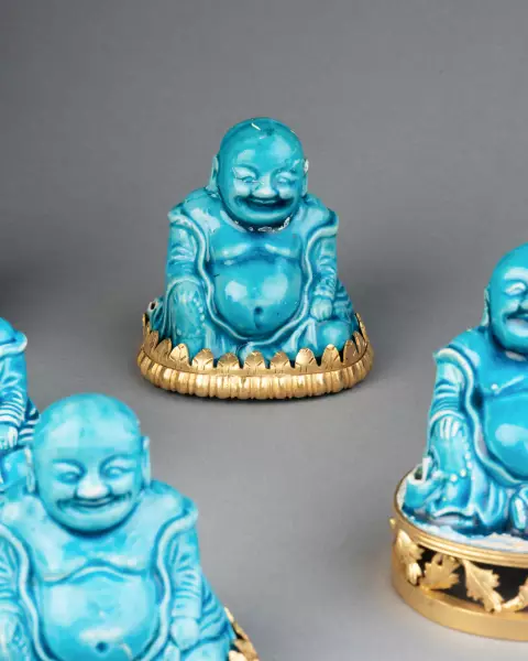 Collection de huit figures de Budai en biscuit turquoise, Chine 18 ème