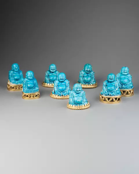 Collection de huit figures de Budai en biscuit turquoise, Chine 18 ème
